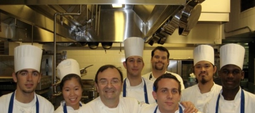 Chef Christopher Aster with Chef Christian Delouvrier, Chef Jordan Lloyd and the kitchen brigade
