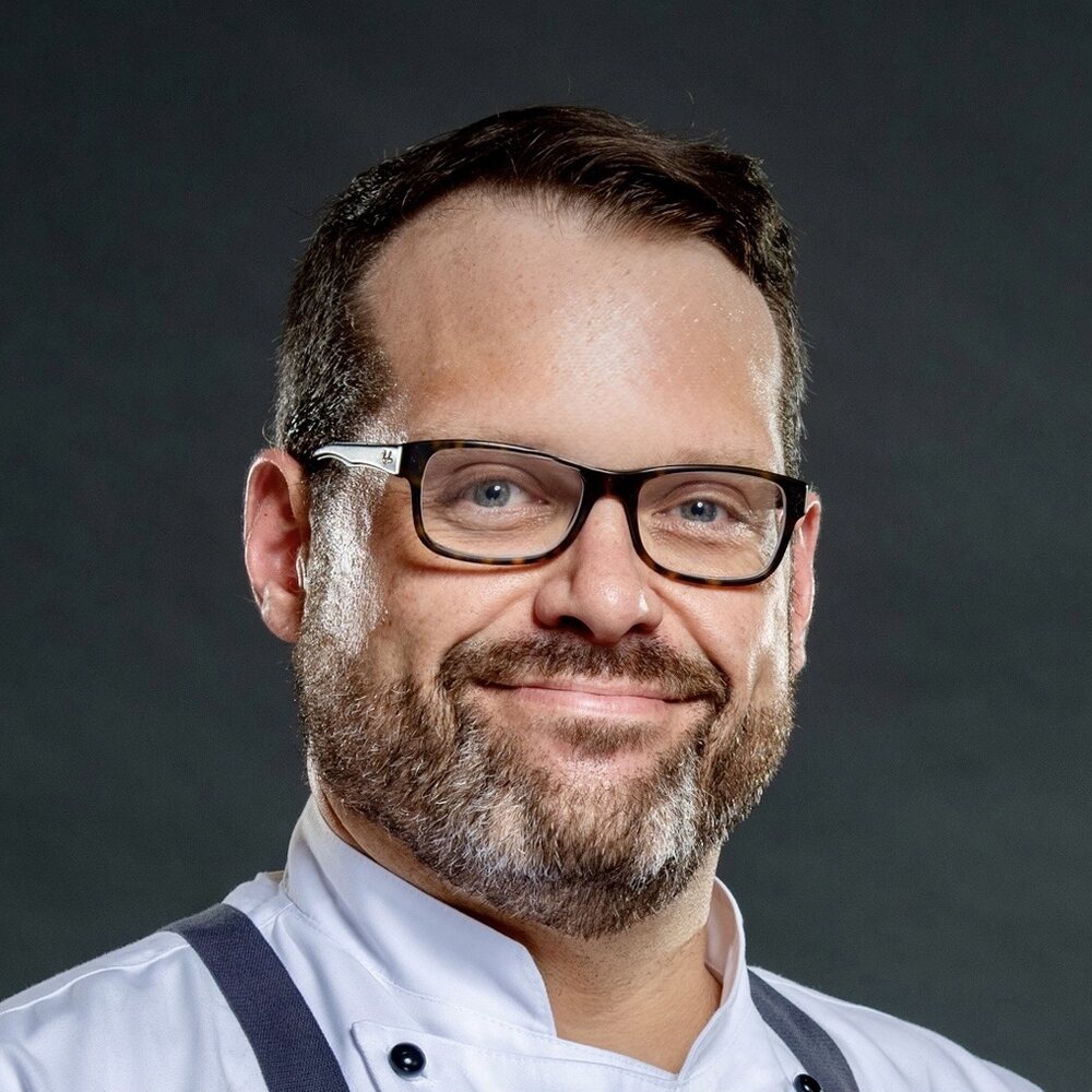 Chef Christopher Aster in chef whites