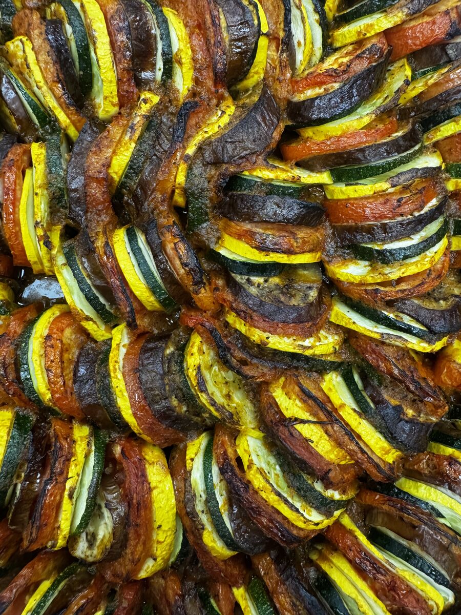 Ratatouille of zucchini, squash and tomato in a spiral
